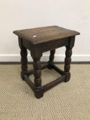 A 17th Century and later joined oak stool,