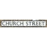 A painted metal street sign inscribed "Church Street" 109.