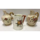 A Royal Worcester etruscan style cream jug with floral spray decoration and gilt handle date marked