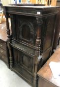 A late 17th Century oak cupboard of small proportions,