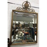 A 19th Century giltwood and gesso framed wall mirror in the George III style,