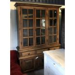 A modern oak dresser in the 18th Century style,