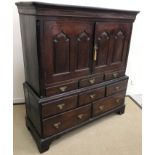 An 18th Century oak cupboard,