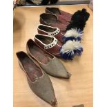 A quantity of Middle Eastern style leather shoes, hats,