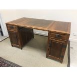 A 20th Century Chinese walnut desk,