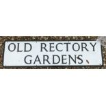 A painted metal street sign inscribed "Old Rectory Gardens" 102 cm x 28 cm