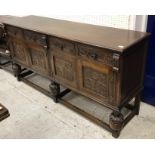 A Maple & Co oak dining room suite comprising carved oak drawer leaf table in the 17th Century