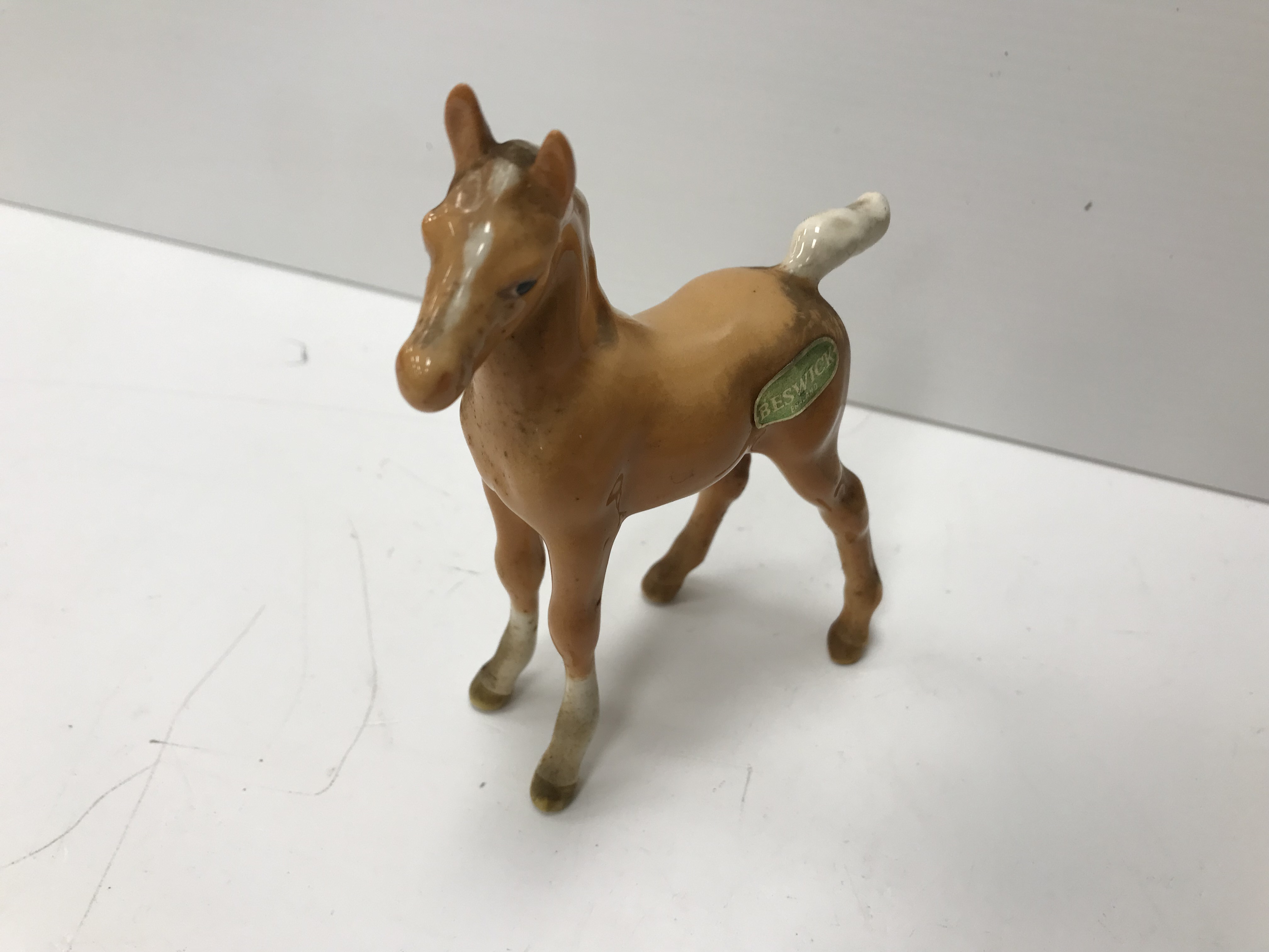 A collection of four Beswick Palomino horse figures together with three Palomino foal figures, - Image 7 of 44