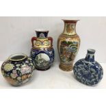 Four various 20th Century Chinese / Japanese vases of varying design, the tallest 44.
