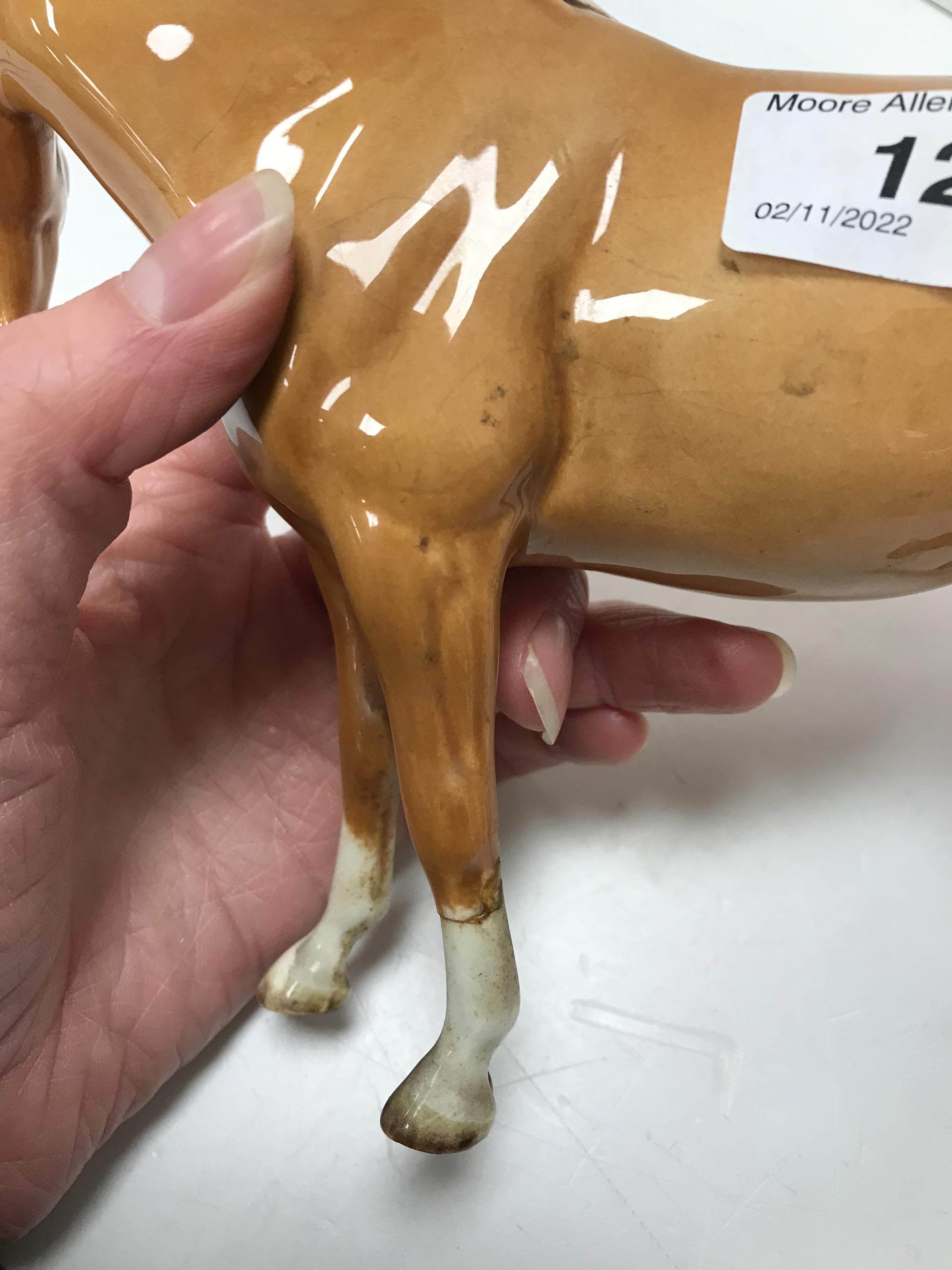 A collection of four Beswick Palomino horse figures together with three Palomino foal figures, - Image 41 of 44