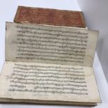 A Tibetan manuscript in lacquered vellum boards 40 x 17 x 6 cm deep