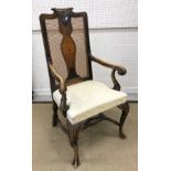 An early 20th Century walnut framed carver chair and standard dining chair in the 18th Century