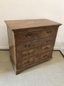 An 18th Century walnut chest,