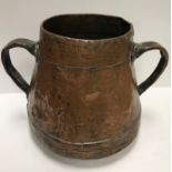 A 19th Century copper two handled water vessel of tapered form with overlaid banding to the top and