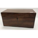 A 19th Century mahogany tea caddy of plain rectangular form, rosewood strung,