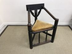 An oak corner chair in the 17th Century manner,