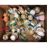 A collection of twenty-four various Beswick and Royal Albert Beatrix Potter figures including "Mrs