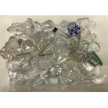 A collection of thirty-two various glass decanter stoppers,