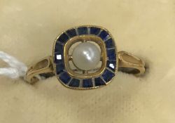 A 20th Century unmarked gold sapphire and pearl set dress ring circa 1915-1920,