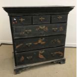 An 18th Century black lacquered and Japanned chest, the later top over a moulded cushion drawer,