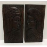 A pair of 19th Century carved oak panels as be-hatted figures in the 17th Century Flemish style 35