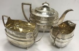 A Regency silver three piece tea set comprising teapot,