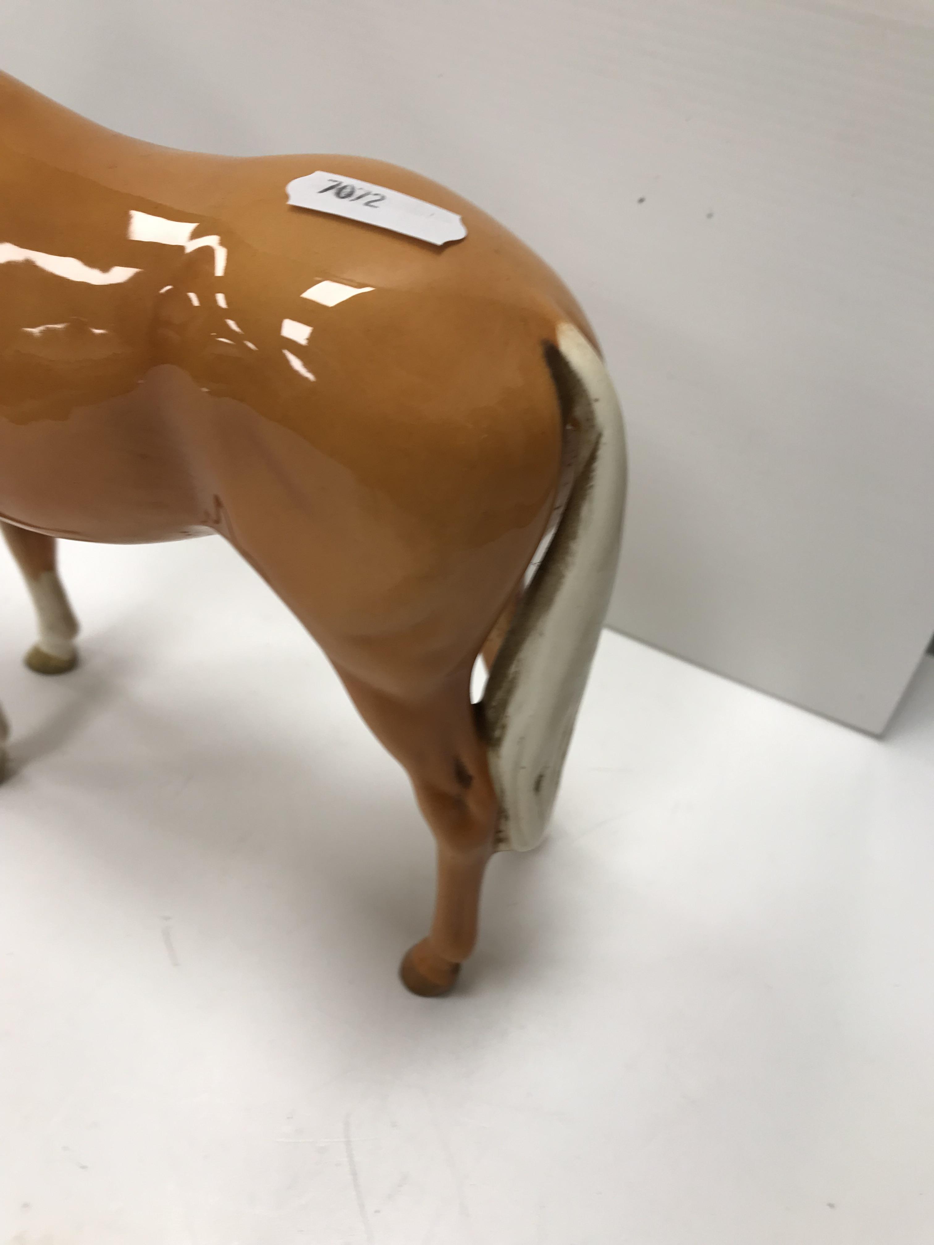 A collection of four Beswick Palomino horse figures together with three Palomino foal figures, - Image 27 of 44