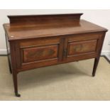 A circa 1900 oak student's bureau with fall front over two shelves 65 cm wide x 124 cm high x 30 cm