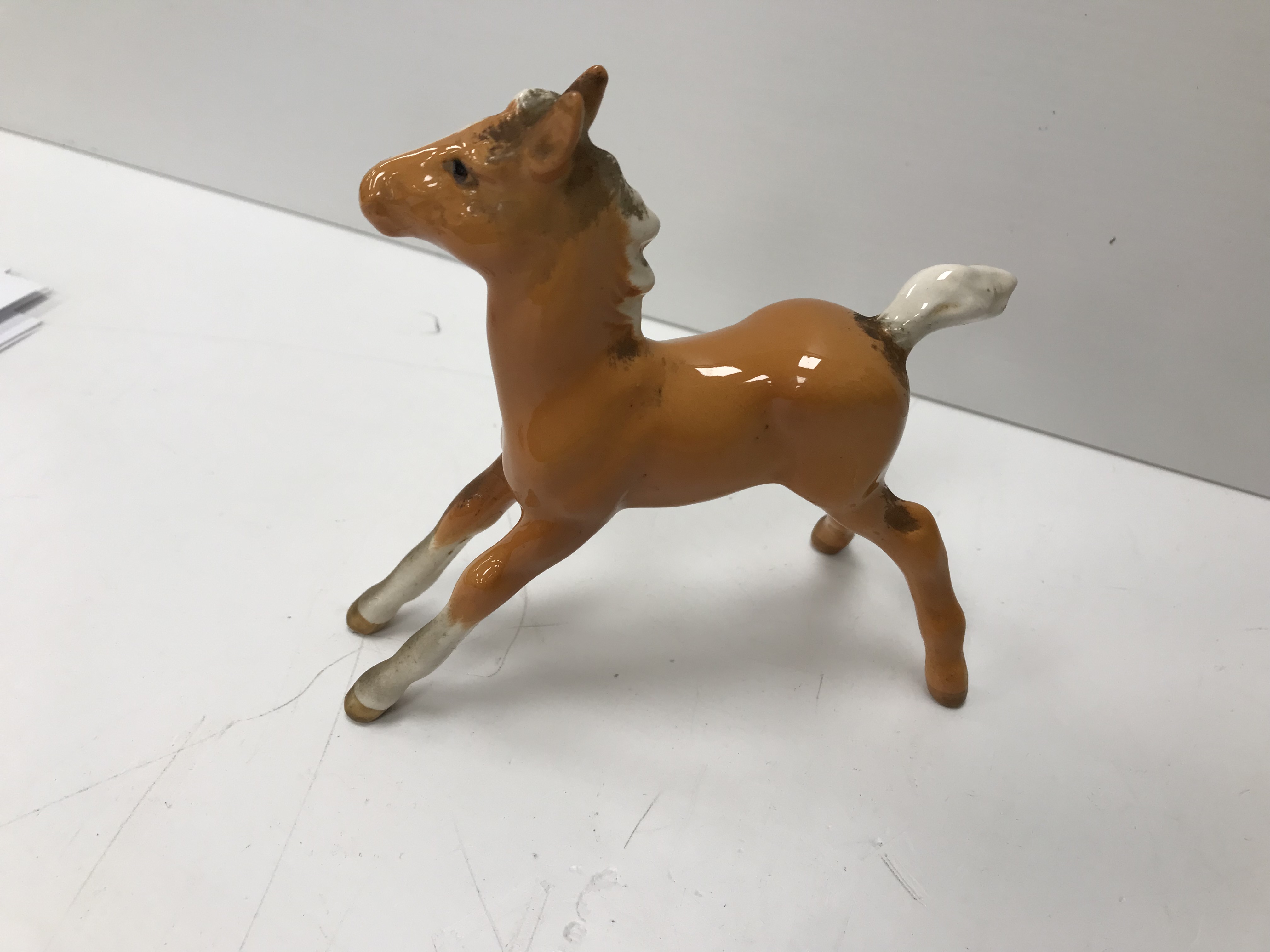 A collection of four Beswick Palomino horse figures together with three Palomino foal figures, - Image 16 of 44