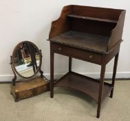 A 19th Century mahogany wash stand, the three quarter galleried shelved back over a single drawer,