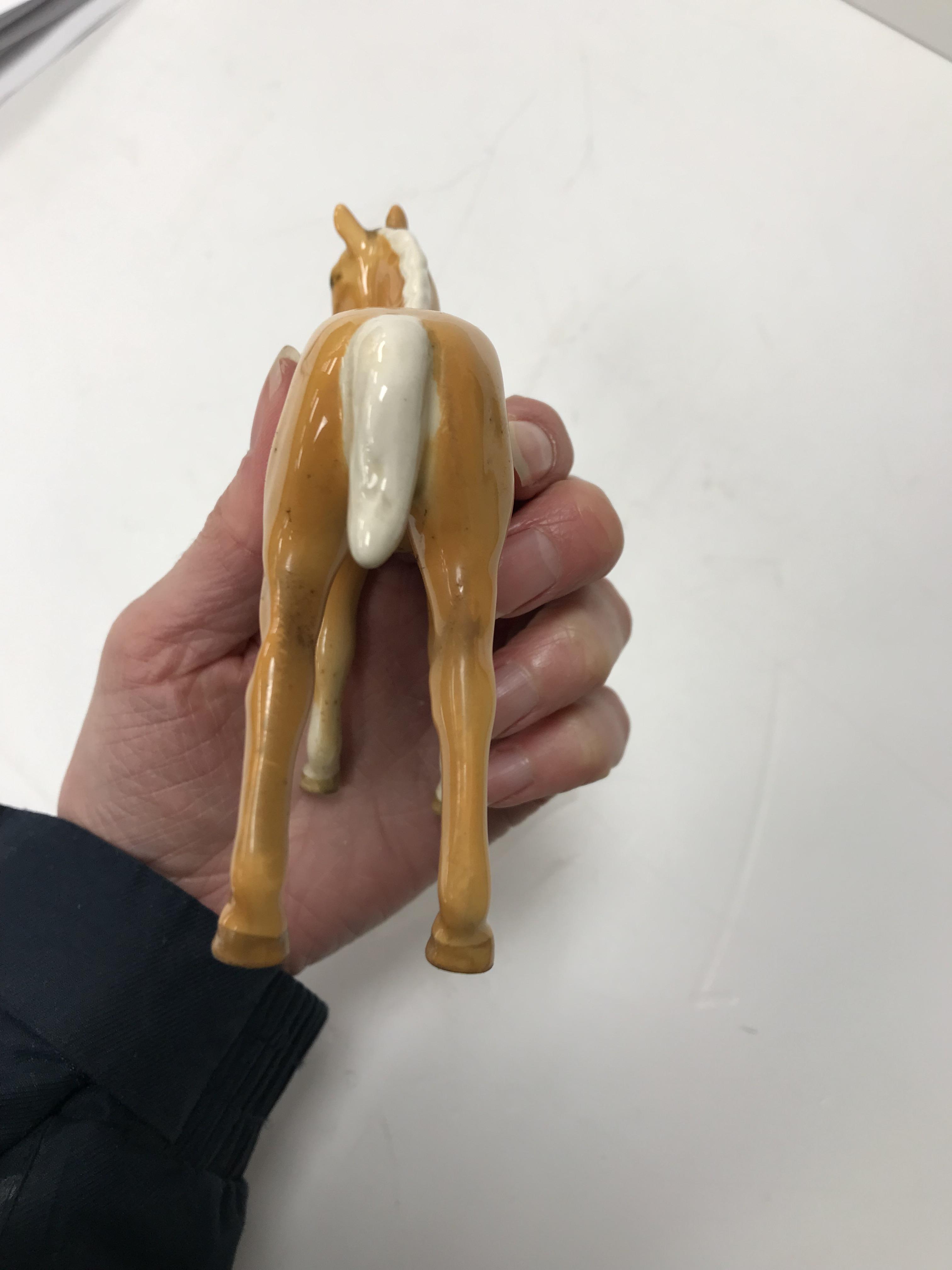 A collection of four Beswick Palomino horse figures together with three Palomino foal figures, - Image 11 of 44