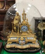 A 19th Century French gilt metal cased mantel clock,