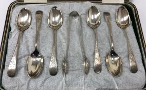 A cased set of six silver tea spoons with engraved decoration and matching sugar tongs and a