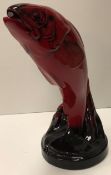 A Doulton flambé figure of a leaping salmon by Fred Moore 30.