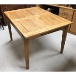 A modern oak farmhouse style kitchen table in the 19th Century manner,
