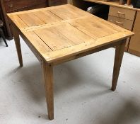 A modern oak farmhouse style kitchen table in the 19th Century manner,