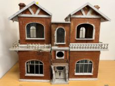 A late Victorian circa 1900 dolls' house (for restoration) together with a collection of dolls'