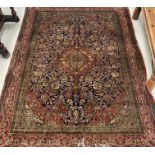 A fine Kashan silk rug,