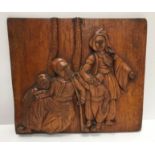An 18th Century Continental oak and carved panel with central figural bust medallion amongst