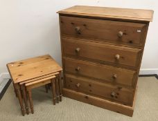 A modern pine chest of four long drawers on a plinth base 89 cm wide x 107 cm high x 45 cm deep