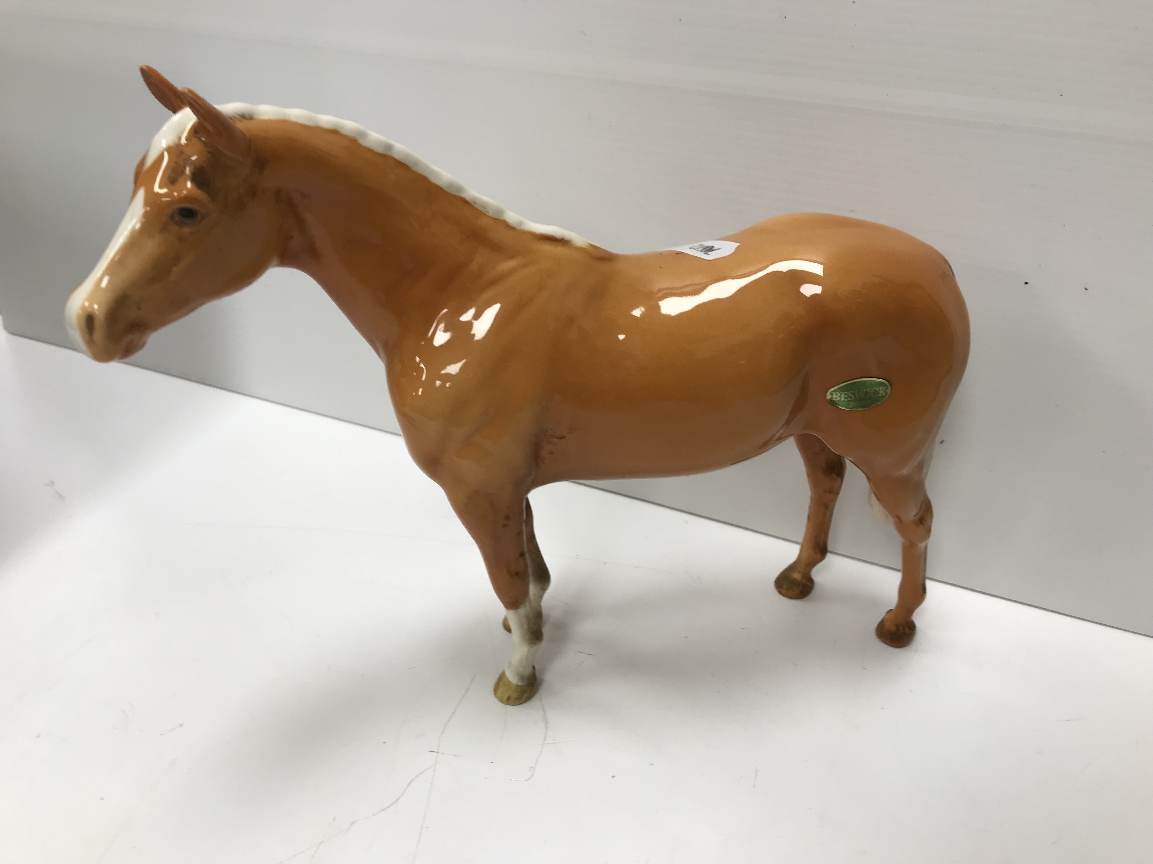 A collection of four Beswick Palomino horse figures together with three Palomino foal figures, - Image 35 of 44