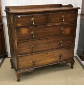 An Edwardian mahogany dressing chest,