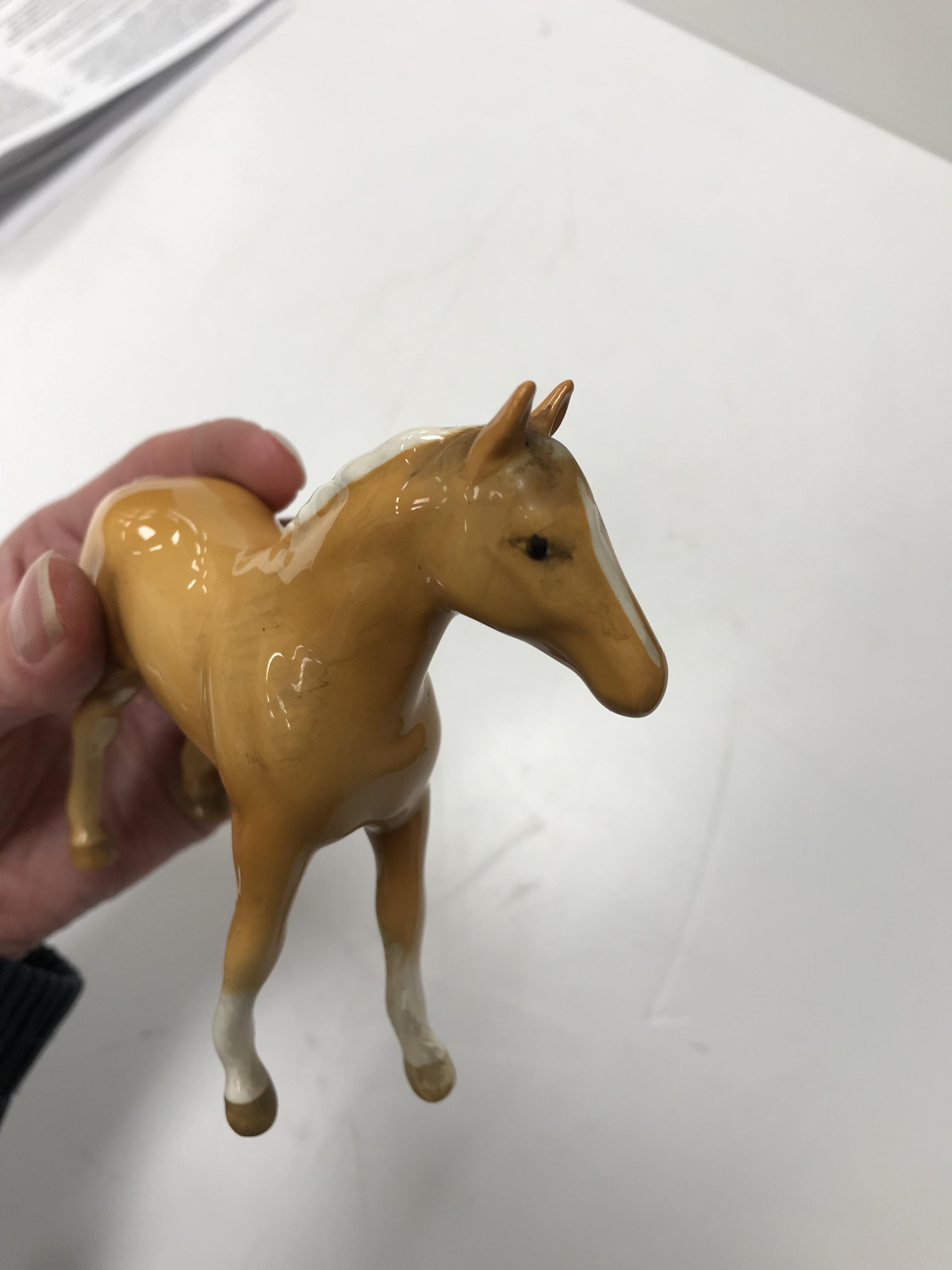 A collection of four Beswick Palomino horse figures together with three Palomino foal figures, - Image 9 of 44