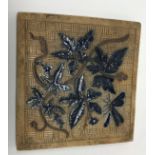 A 19th Century Martin Brothers stoneware tile by Robert Wallace Martin with incised decoration of