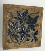 A 19th Century Martin Brothers stoneware tile by Robert Wallace Martin with incised decoration of