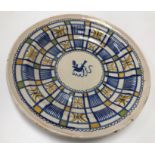 A 19th Century tin glazed Delft ware plate,