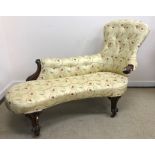 A Victorian button upholstered rosewood framed chaise longue on cabriole legs to scroll feet and