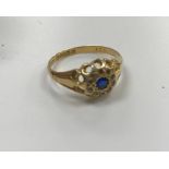 Two 18 carat gold mounted sapphire and diamond dress rings, one with three graduated sapphires,