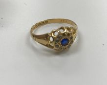 Two 18 carat gold mounted sapphire and diamond dress rings, one with three graduated sapphires,