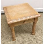 A modern cherry wood coffee table,